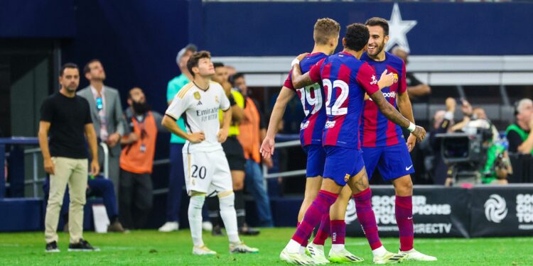 Jul 29, 2023; Arlington, Texas, USA;  FC Barcelona midfielder Fermin Lopez Martin (29) celebrates with teammates after scoring a goal during the second half against Real Madrid at AT&T Stadium. Mandatory Credit: Kevin Jairaj-USA TODAY Sports
